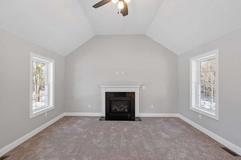 144 French Road, Unit LOT 3 Templeton, MA 01468 - Photo 7 of 40 an empty room with chandelier fan and windows