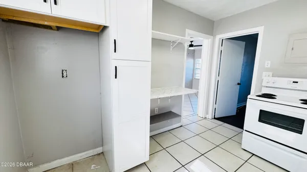 a bathroom with a shower and a sink
