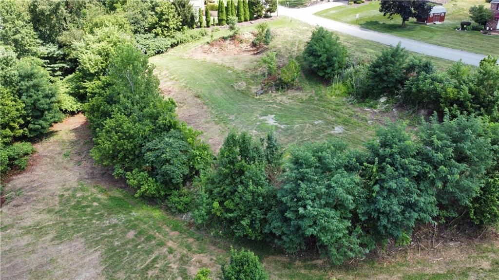 Lot 10 Windcrest Drive Cecil, PA 15321 - Photo 3 of 8 a view of a yard with plants and a fountain