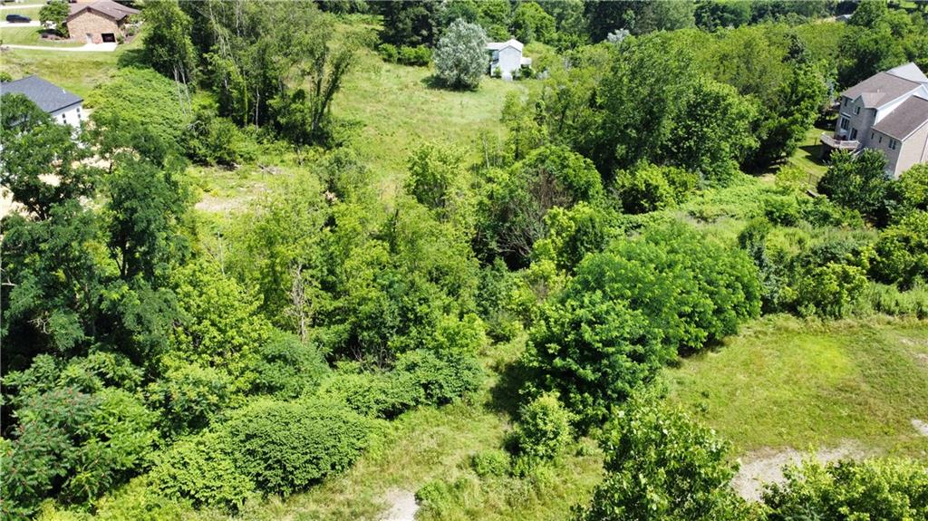 Lot 10 Windcrest Drive Cecil, PA 15321 - Photo 4 of 8 an aerial view of a house with a yard
