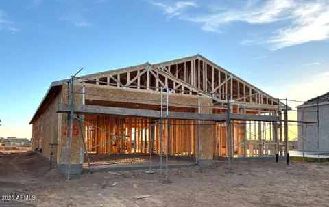 a front view of a house with yard
