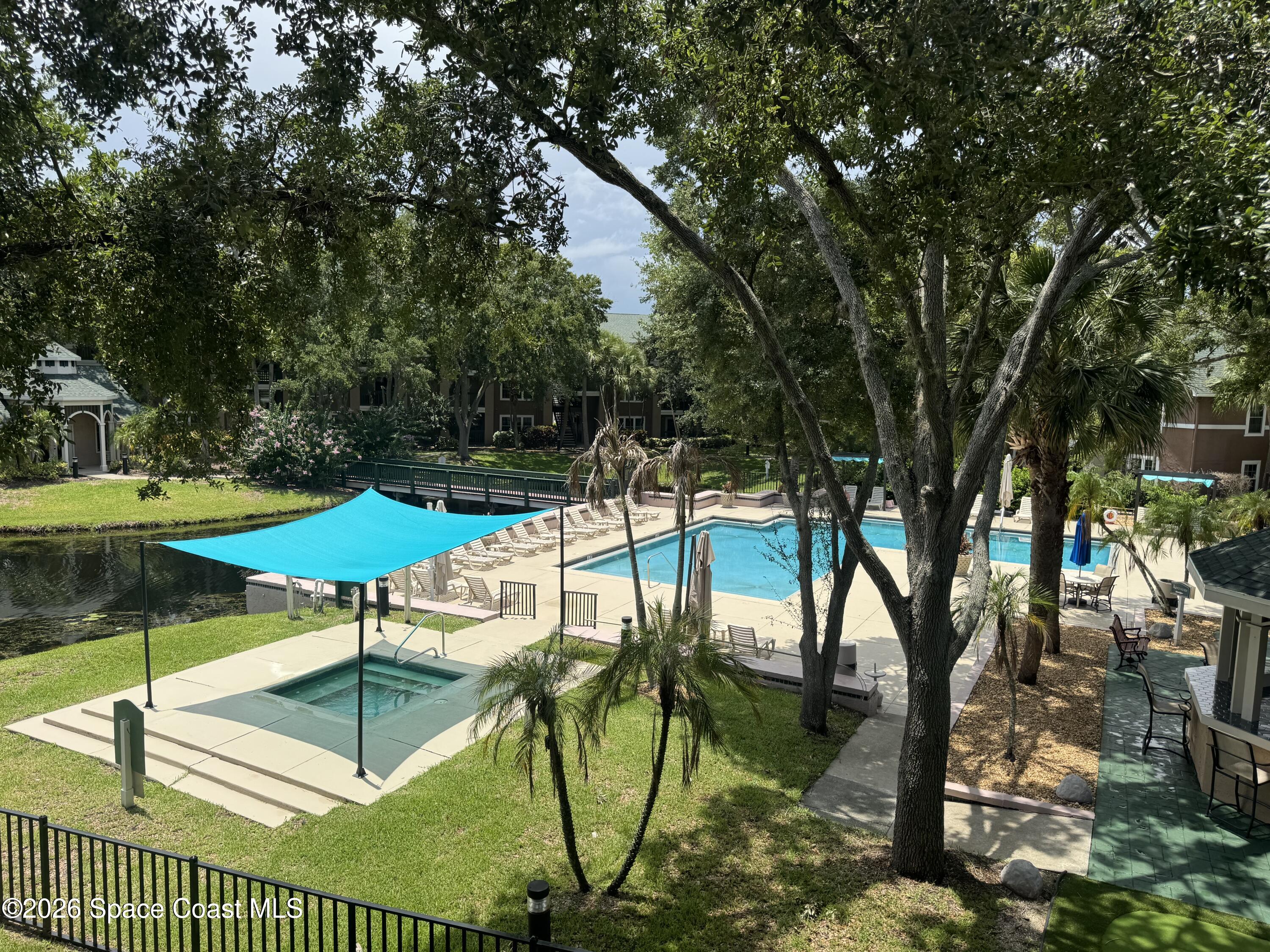 7667 North Wickham Road, Unit 223 Melbourne, FL 32940 - Photo 2 of 18 Pool area