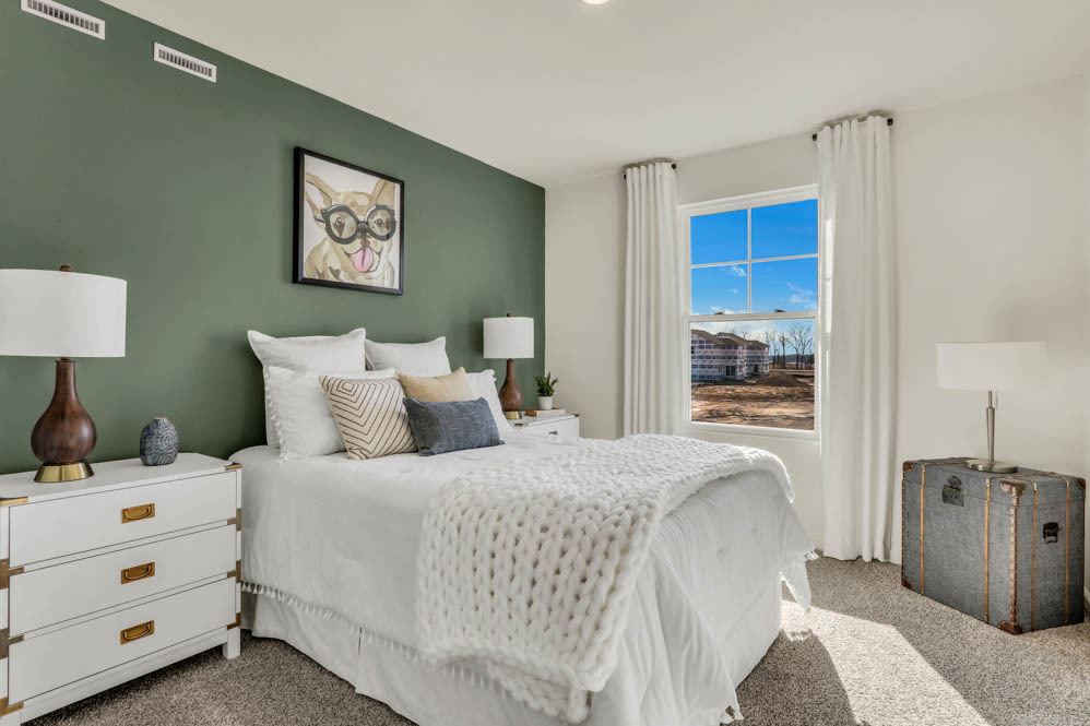 2433 Semillon Street Oswego, IL 60543 - Photo 16 of 27 a bedroom with a bed and a view of bathroom