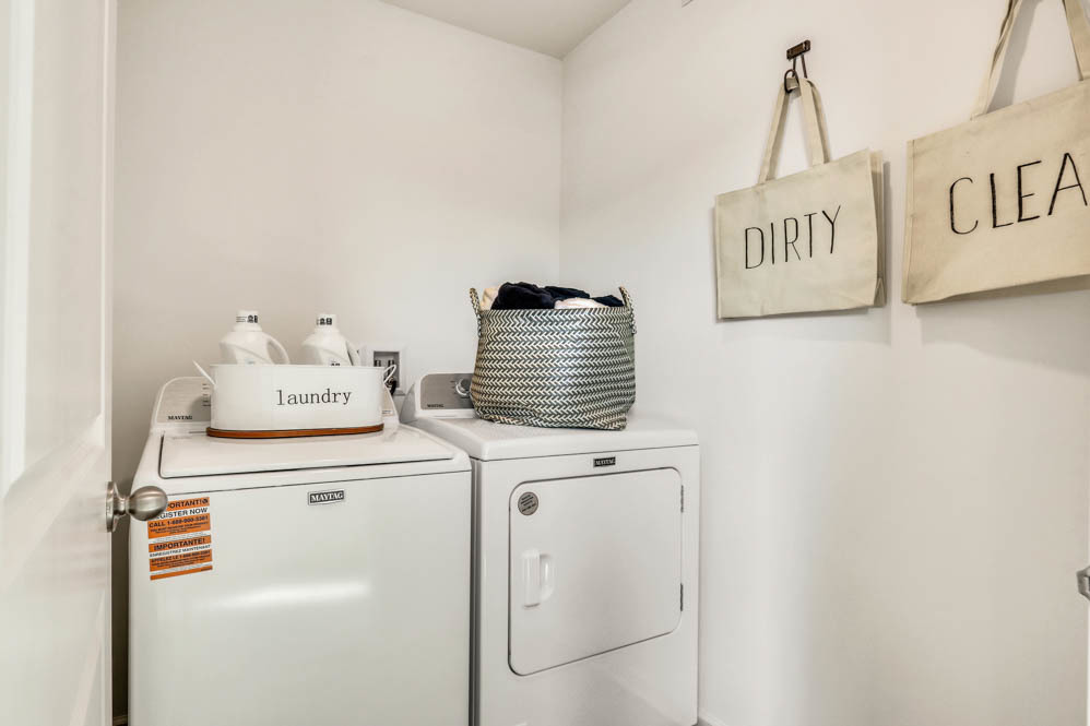 2433 Semillon Street Oswego, IL 60543 - Photo 22 of 27 a utility room with dryer and washer