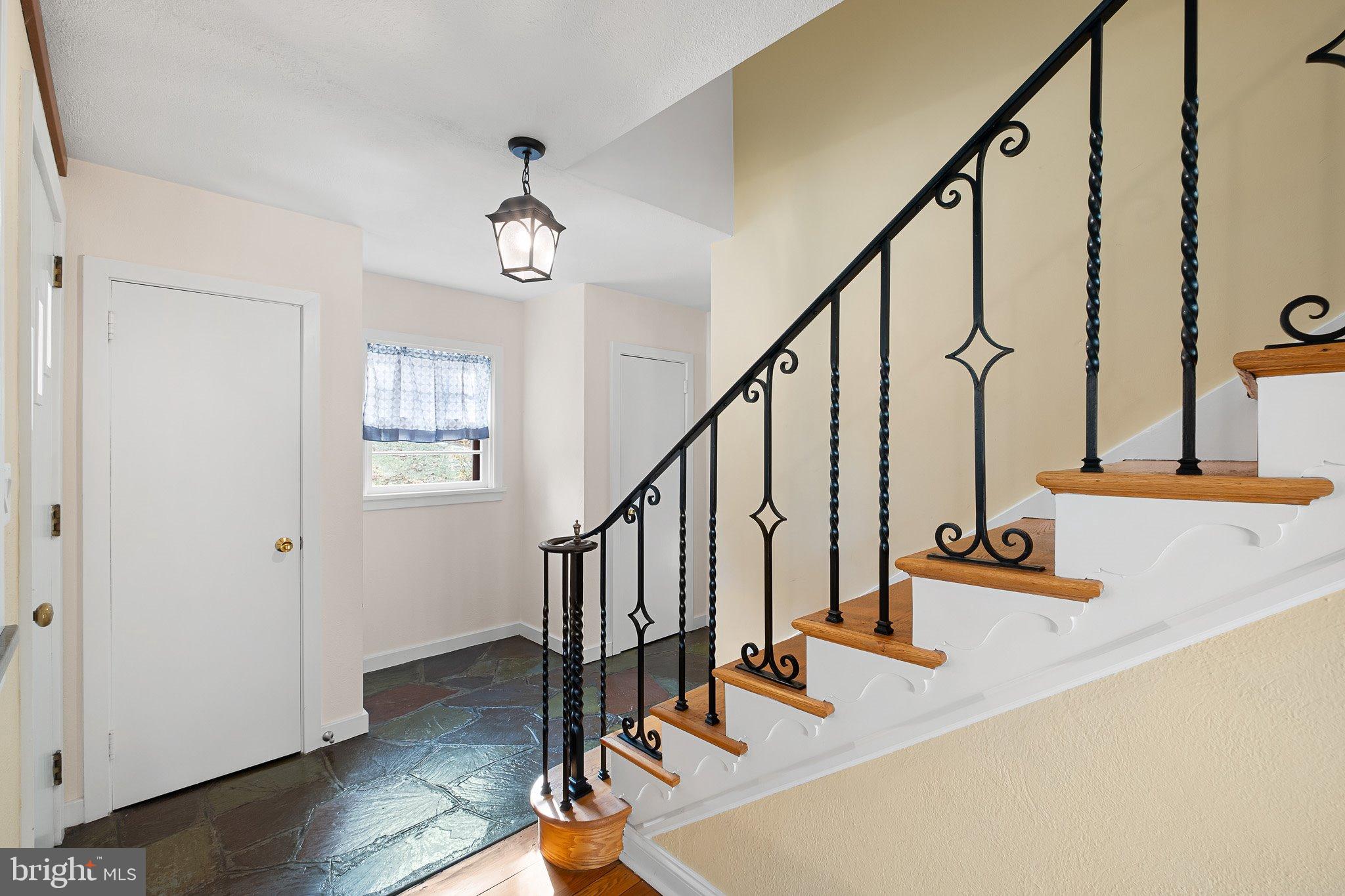 370 Marple Road Broomall, PA 19008 - Photo 17 of 46 a view of an entryway with wooden floor and stairs