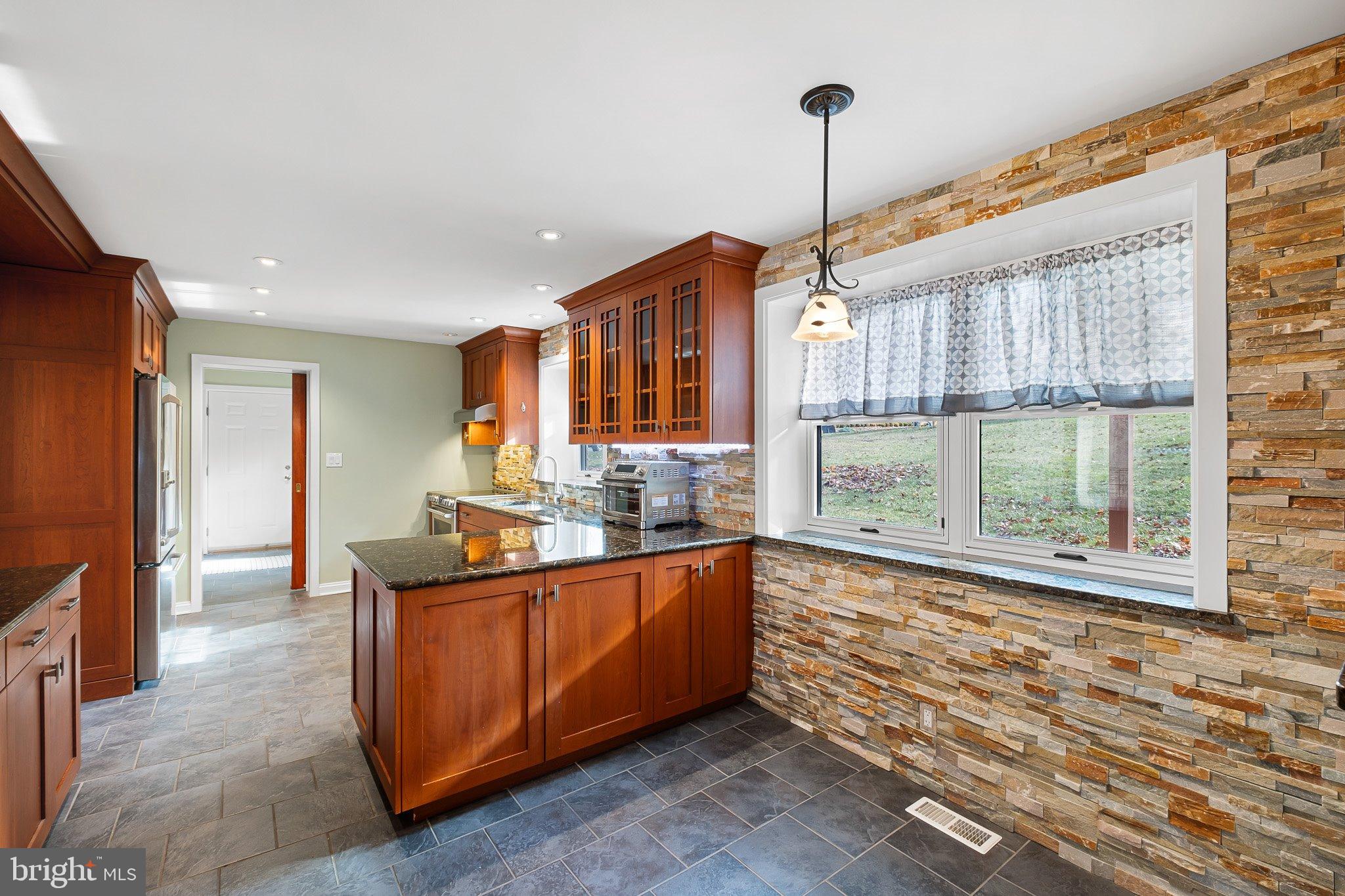 370 Marple Road Broomall, PA 19008 - Photo 18 of 46 a kitchen with sink and window