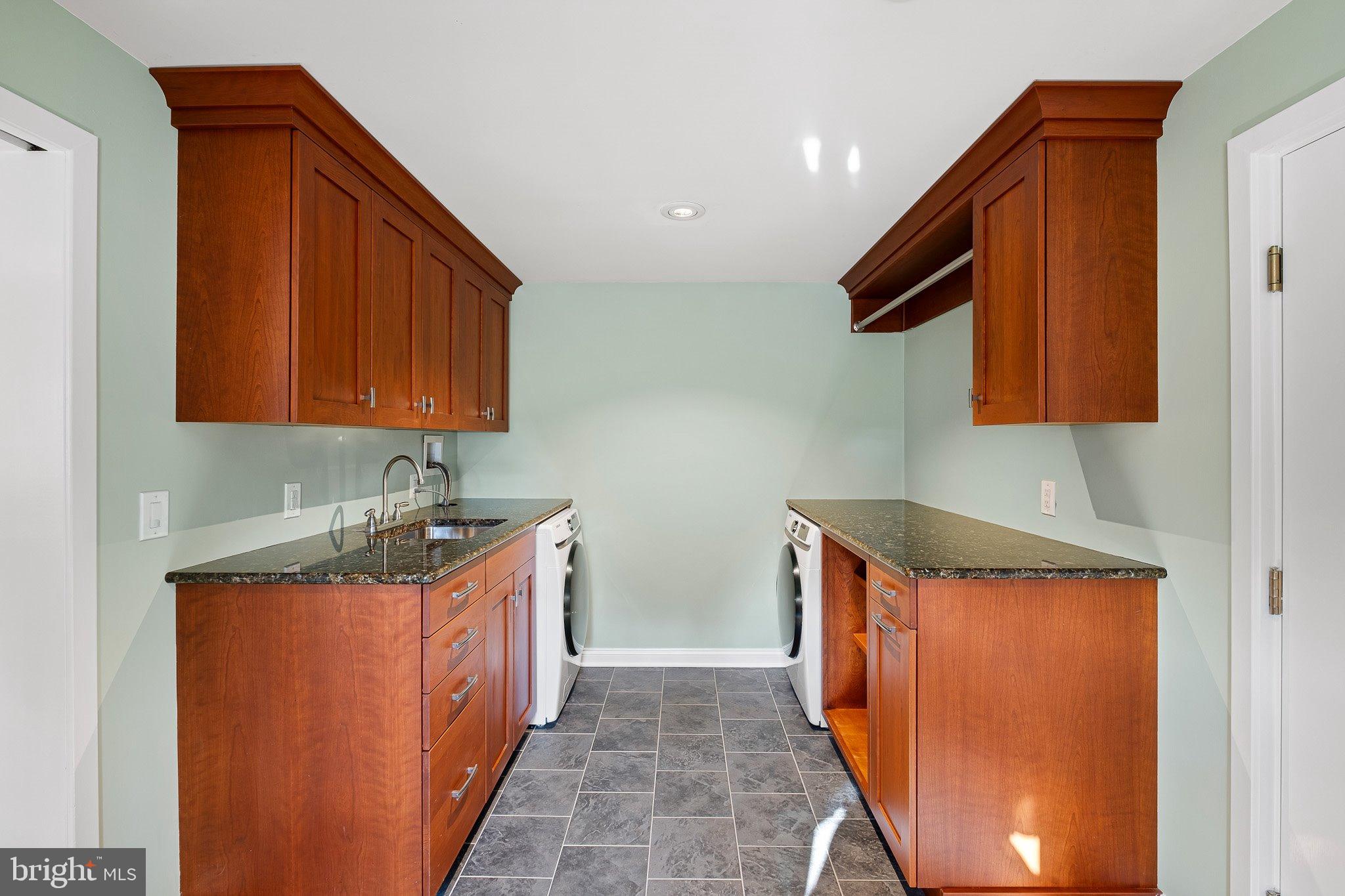 370 Marple Road Broomall, PA 19008 - Photo 23 of 46 a hallway with washer and dryer