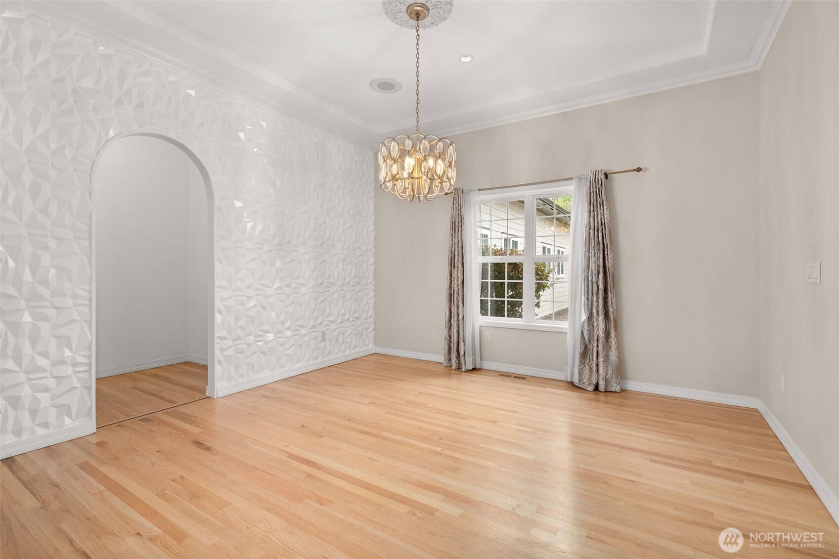 9609 346th Street South Roy, WA 98580 - Photo 12 of 37 a view of an empty room with window and chandelier fan