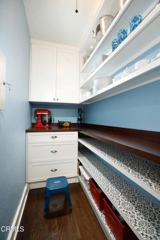 a room with storage and utility