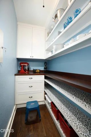 a room with storage and utility