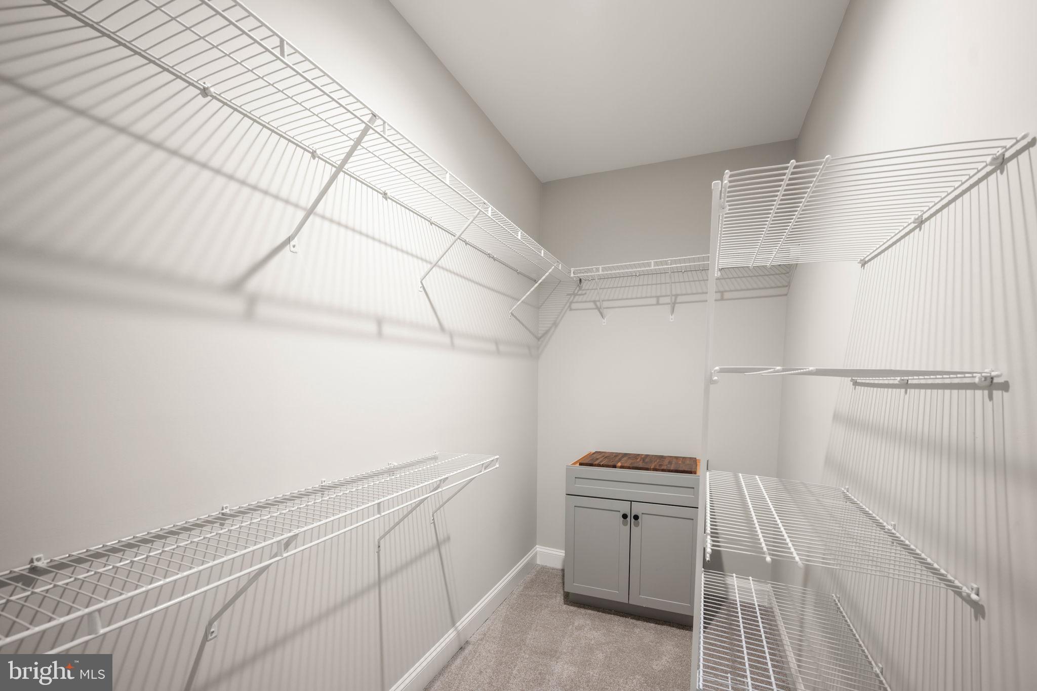 9436 Ridgely Avenue Baltimore, MD 21234 - Photo 21 of 44 a view of a room with racks on the wall