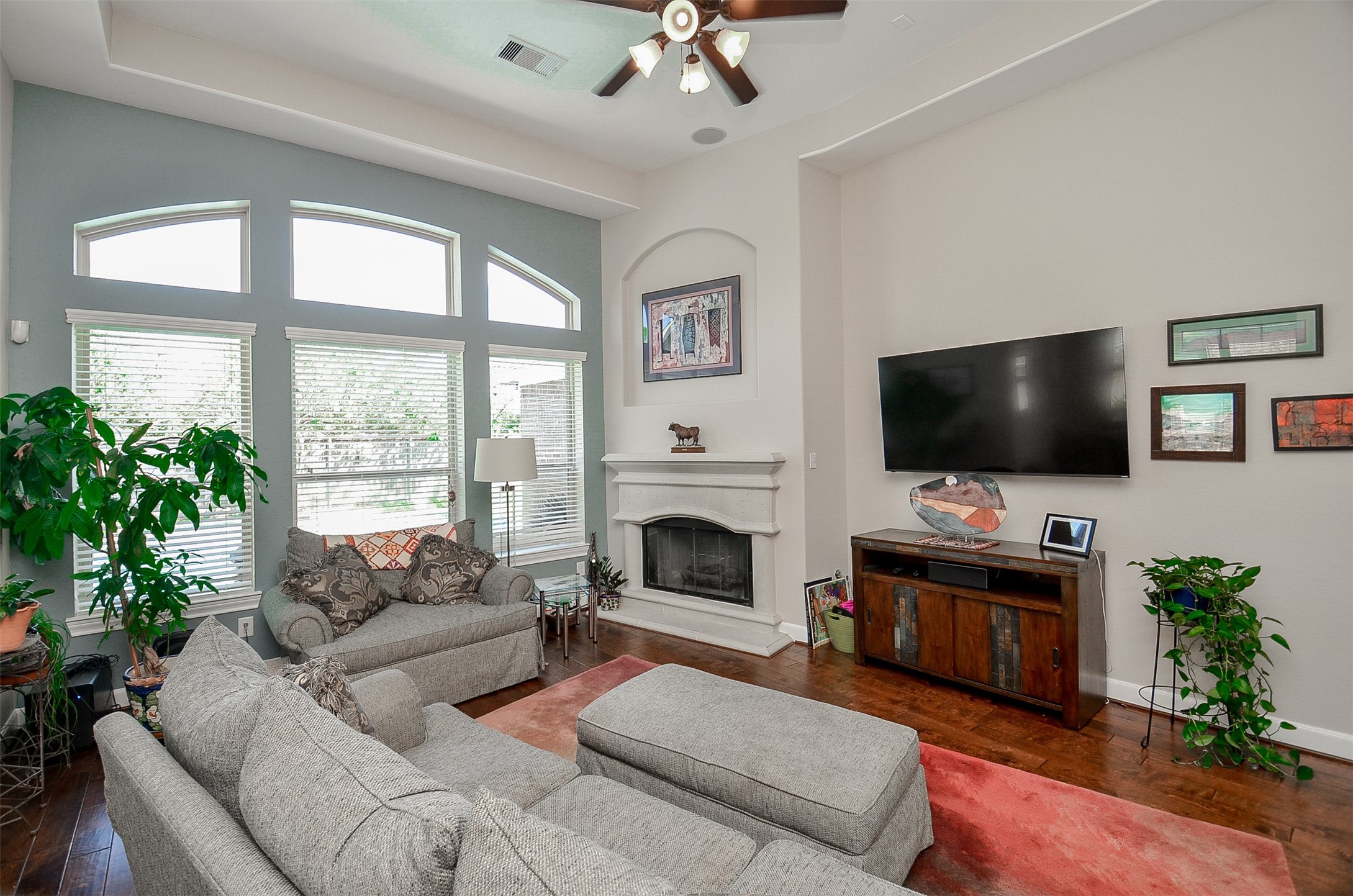 1310 Ellis Grove Lane Rosenberg, TX 77471 - Photo 12 of 38 a living room with furniture and a flat screen tv