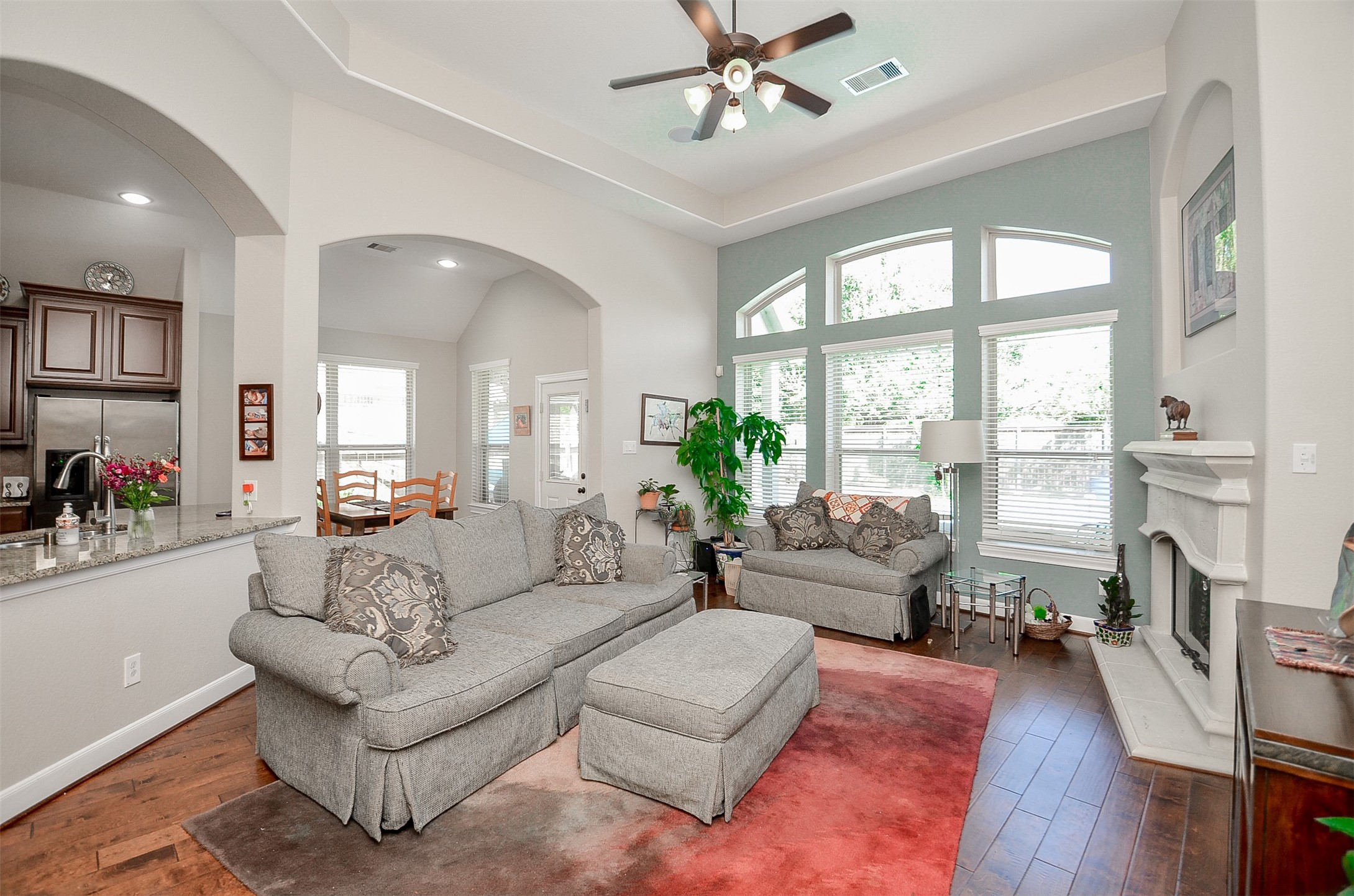 1310 Ellis Grove Lane Rosenberg, TX 77471 - Photo 13 of 38 a living room with fireplace furniture and a large window