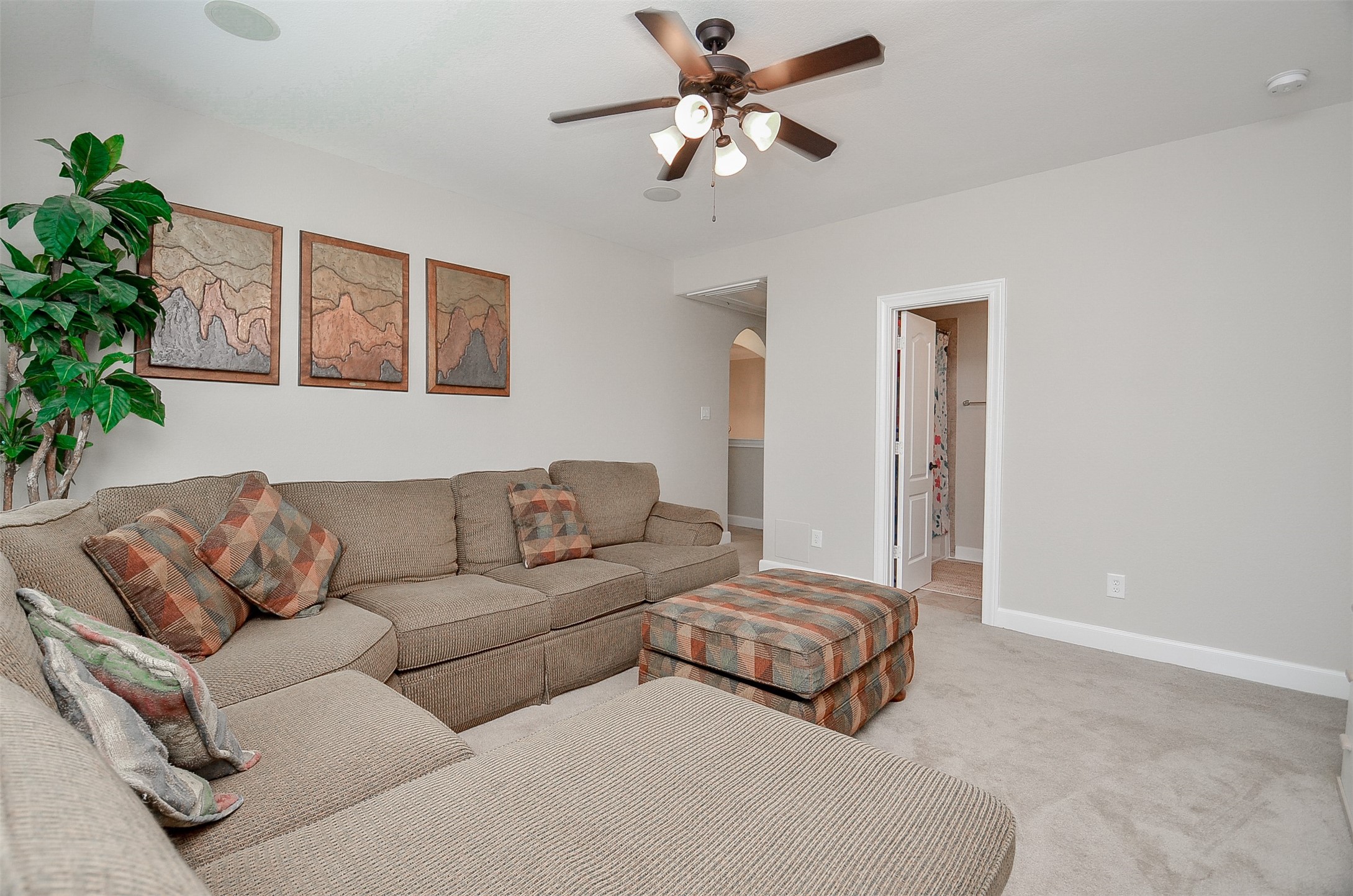 1310 Ellis Grove Lane Rosenberg, TX 77471 - Photo 24 of 38 a living room with furniture and a potted plant