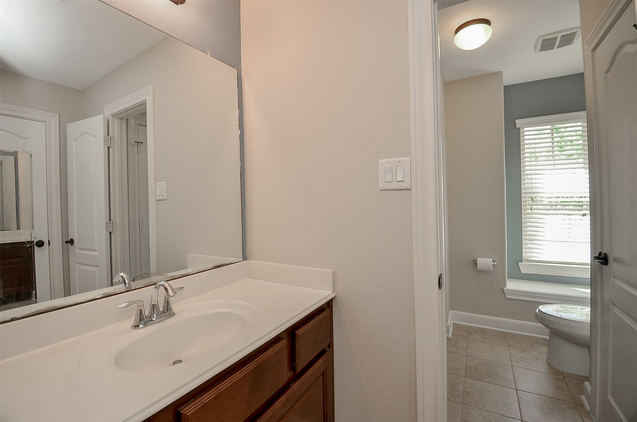 1310 Ellis Grove Lane Rosenberg, TX 77471 - Photo 26 of 38 a bathroom with a sink and a mirror