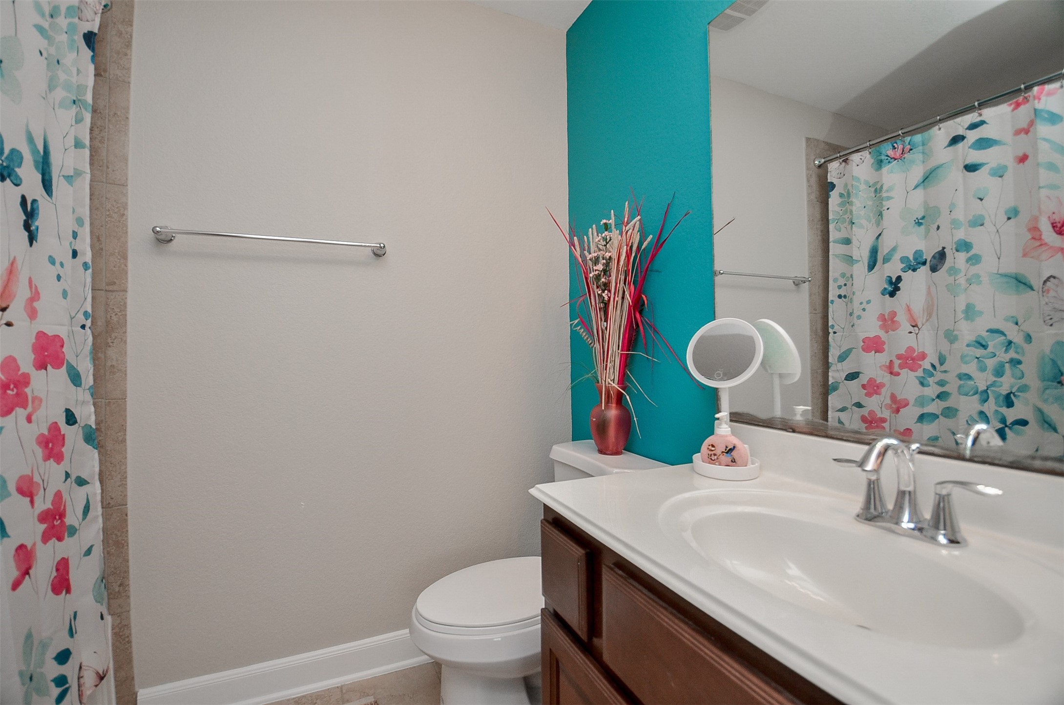 1310 Ellis Grove Lane Rosenberg, TX 77471 - Photo 31 of 38 a bathroom with a sink toilet and vanity