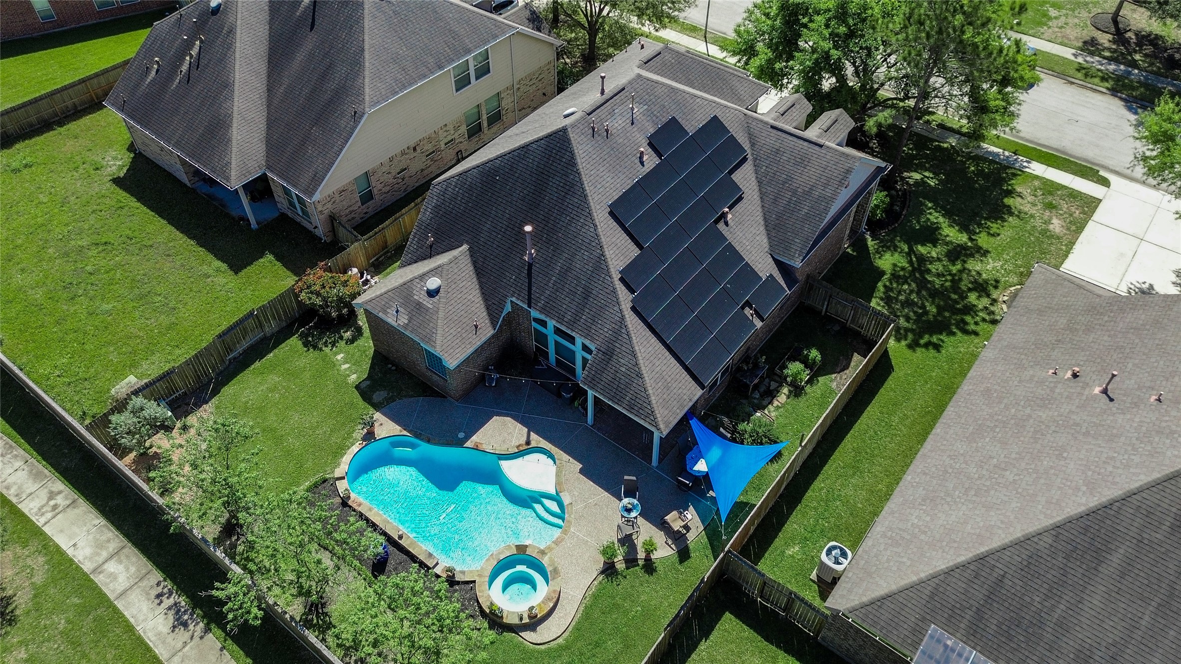 1310 Ellis Grove Lane Rosenberg, TX 77471 - Photo 38 of 38 an aerial view of a house with garden space and street view
