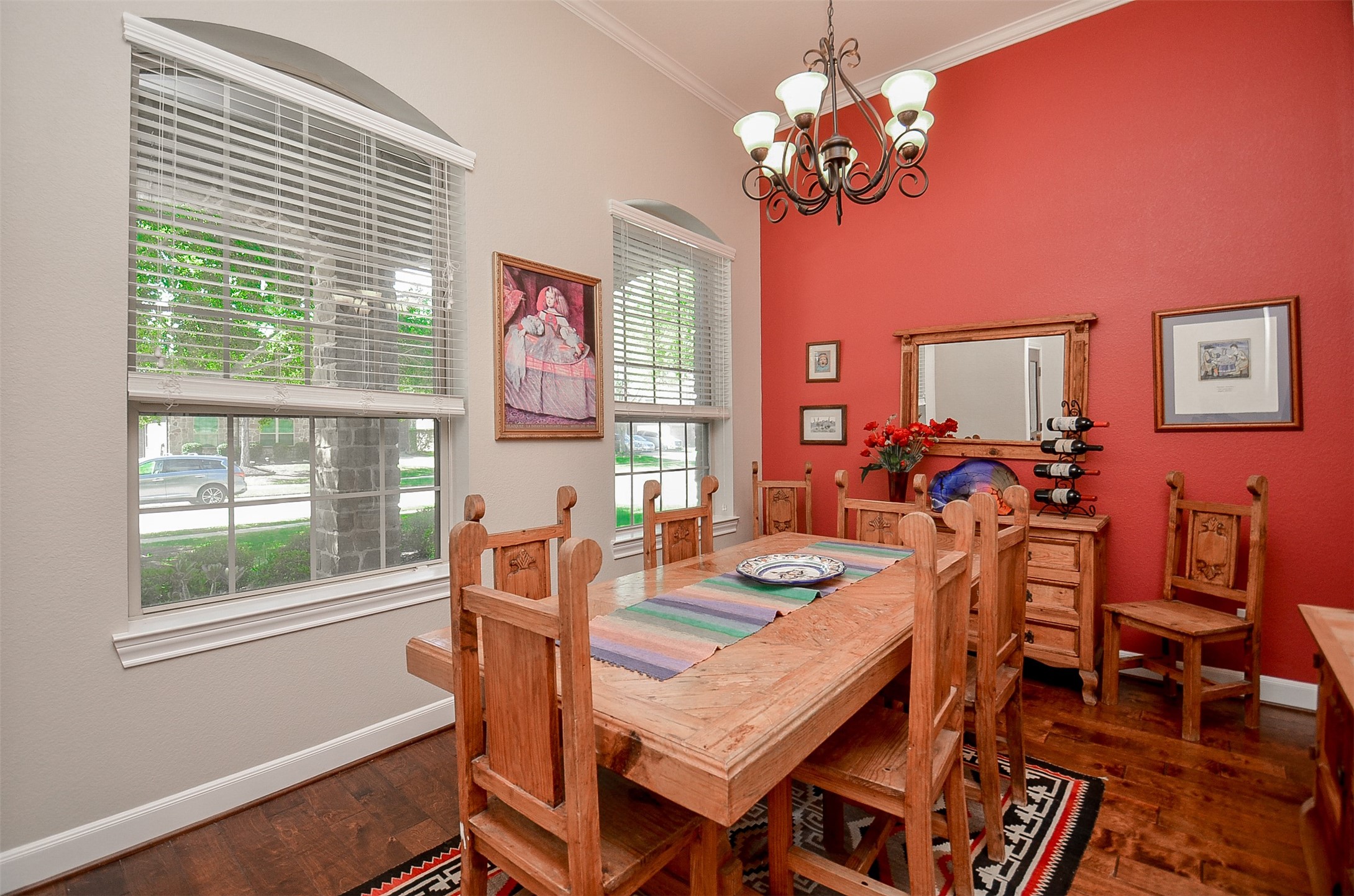 1310 Ellis Grove Lane Rosenberg, TX 77471 - Photo 9 of 38 a view of a dining room with furniture a chandelier and a window