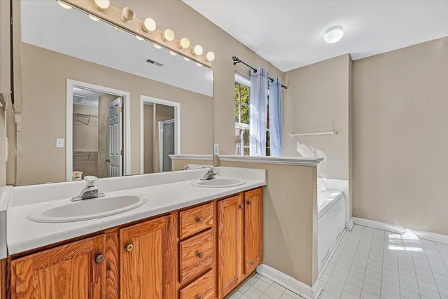 a view of an entryway with wooden floor and windows