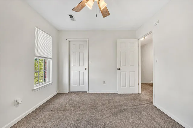 a view of a porch with wooden floor and stairs
