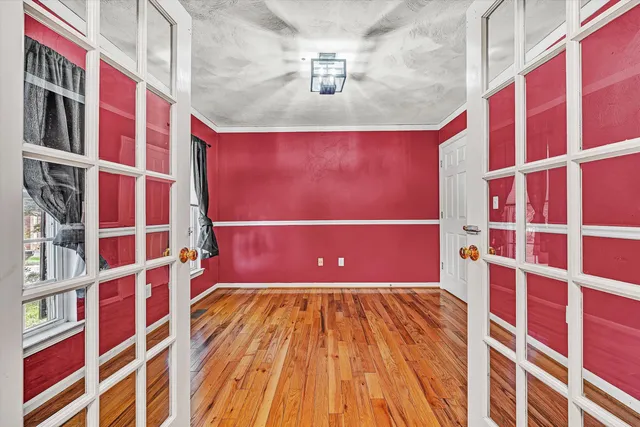 a view of a livingroom with wooden floor