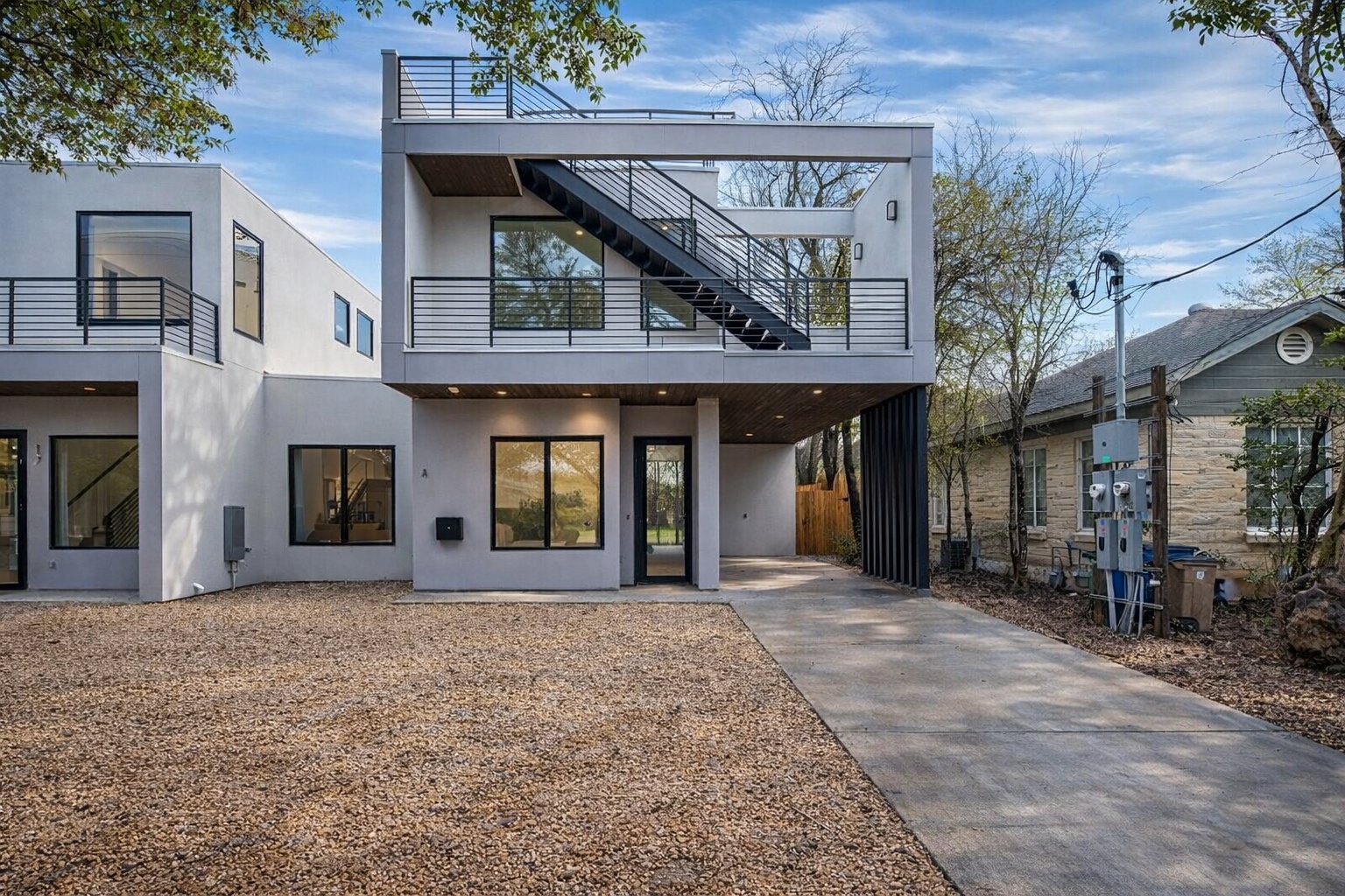 1704 Kinney Avenue, Unit A Austin, TX 78704 - Photo 1 of 1 a front view of a brick house with a outdoor space