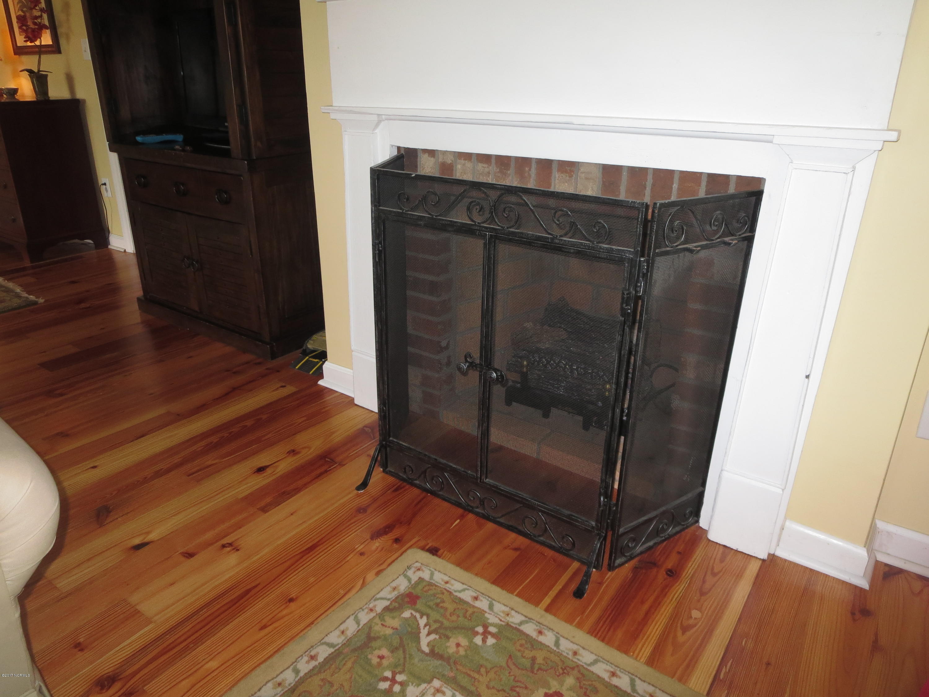 8488 Old 125 Road Scotland Neck, NC 27874 - Photo 8 of 69 living room fireplace