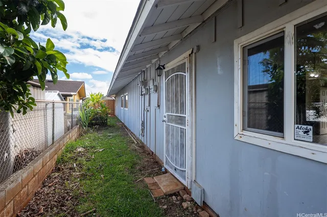 a view of a house with a yard and garage