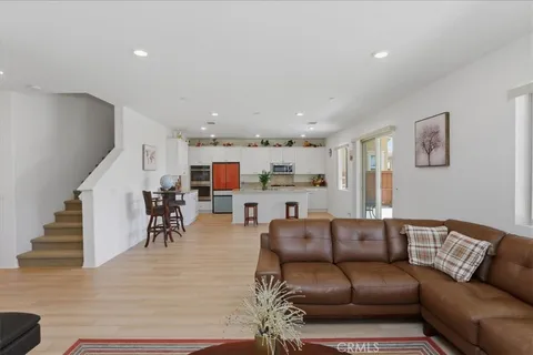 a living room with furniture and a table