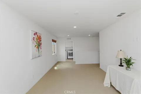 a view of a livingroom with a potted plant
