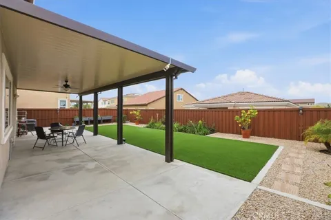 a view of yard with outdoor seating