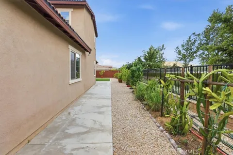 a view of a backyard with plants