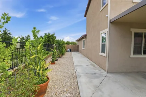 a view of a pathway with a yard