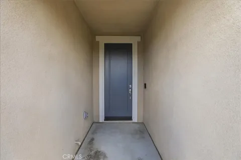 a view of hallway with closet