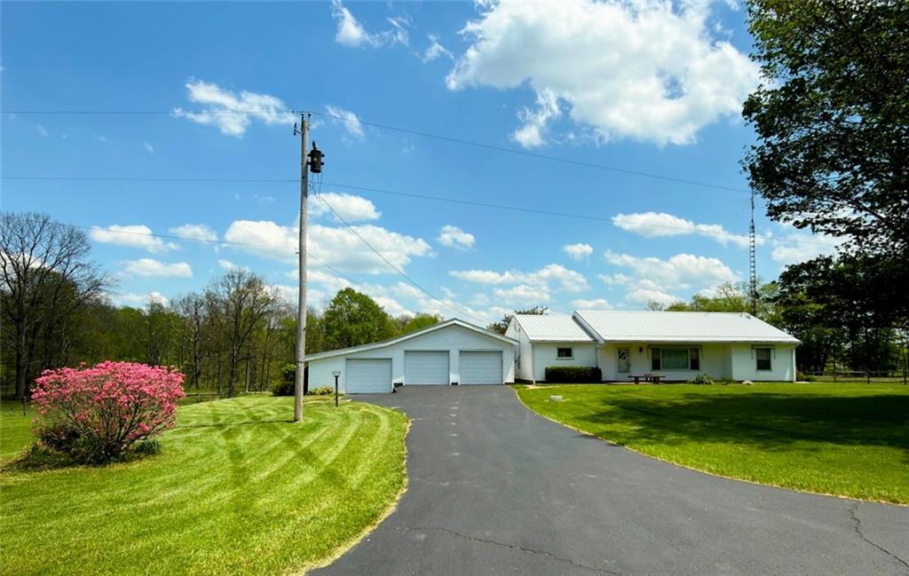 480 South Maysville Road Greenville, PA 16125 - Photo 4 of 20 a front view of a house with a garden