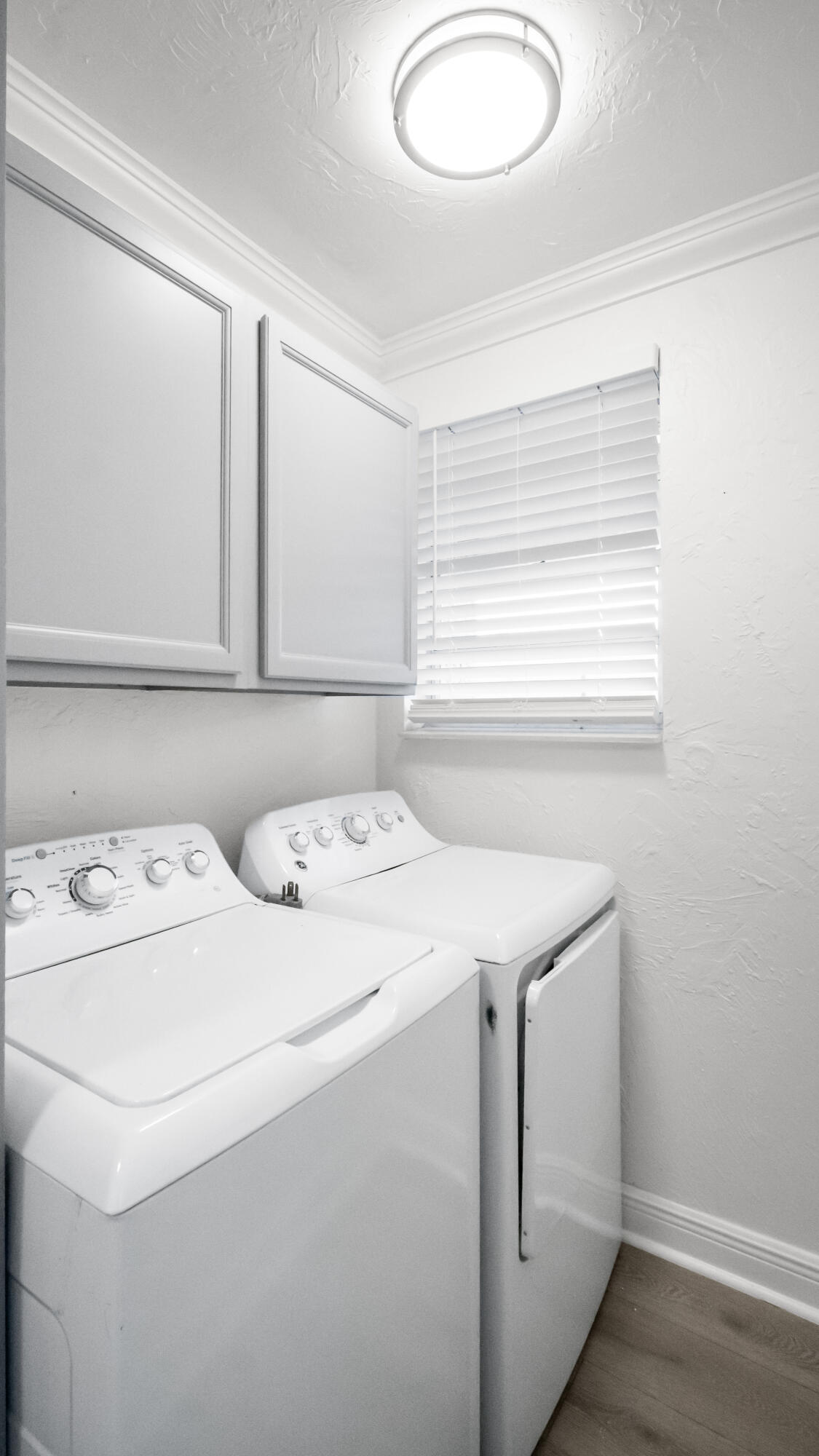 1233 West 32nd Street Riviera Beach, FL 33404 - Photo 22 of 25 a utility room with dryer and washer