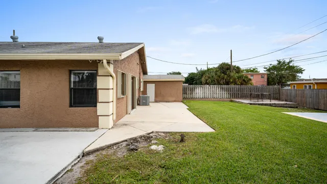 a front view of house with yard