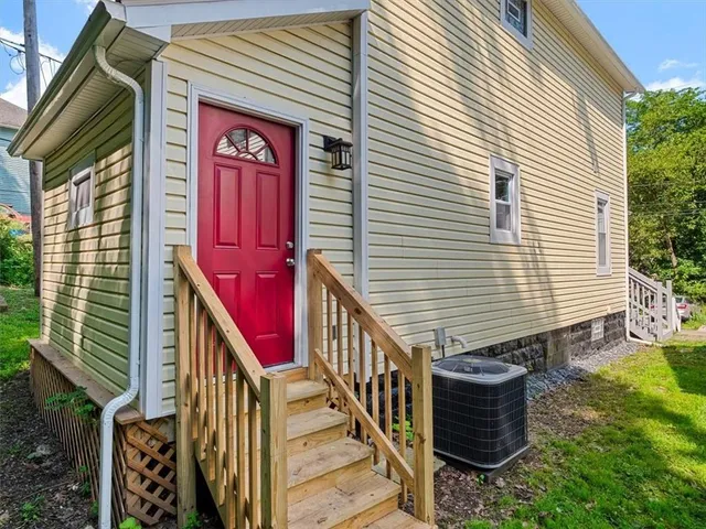 a front view of a house with balcony