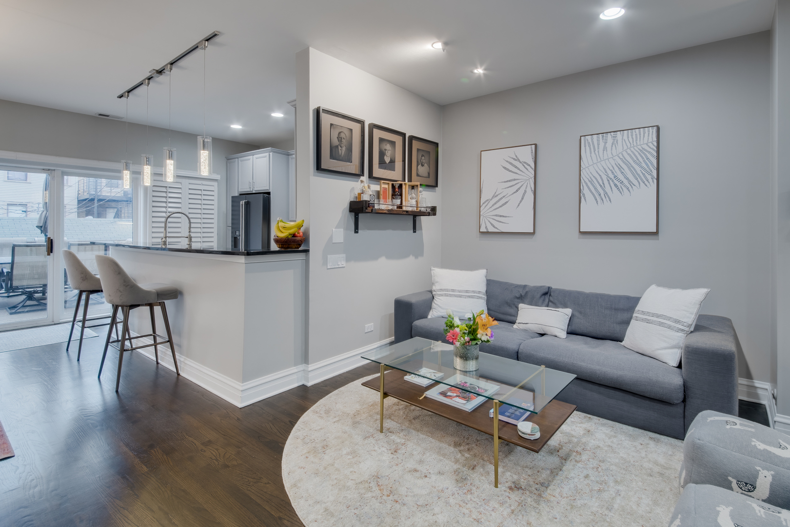 1316 West Fillmore Street, Unit B Chicago, IL 60607 - Photo 13 of 42 a living room with furniture and kitchen view
