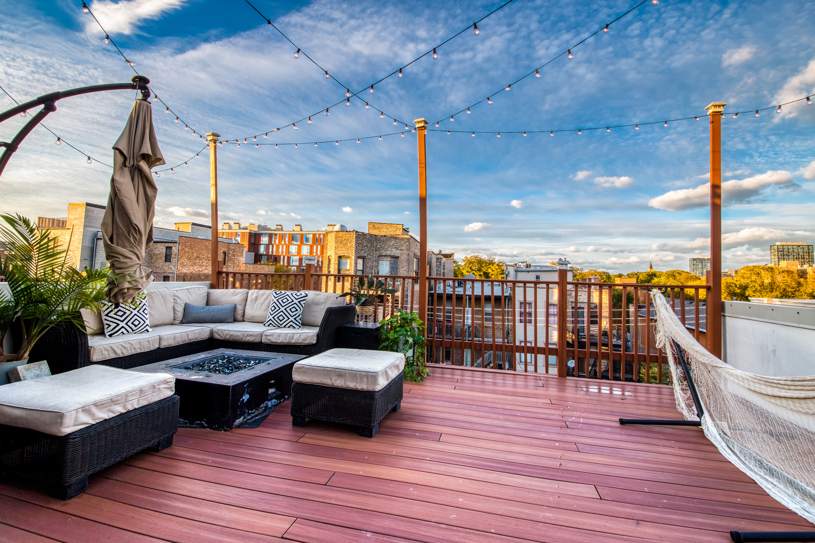 1316 West Fillmore Street, Unit B Chicago, IL 60607 - Photo 31 of 42 a living room with patio furniture and a wooden floor