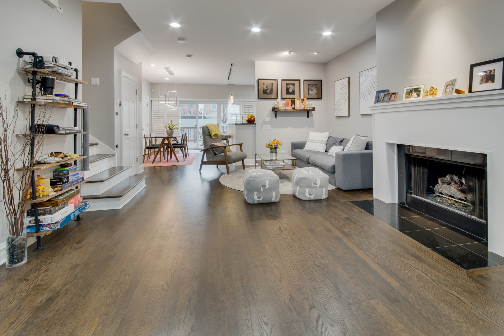 1316 West Fillmore Street, Unit B Chicago, IL 60607 - Photo 6 of 42 a living room with furniture and a fireplace