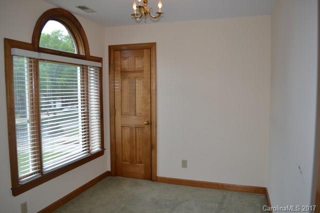 483 Beacon Knoll Lane Fort Mill, SC 29708 - Photo 11 of 21 an empty room with windows and outdoor view