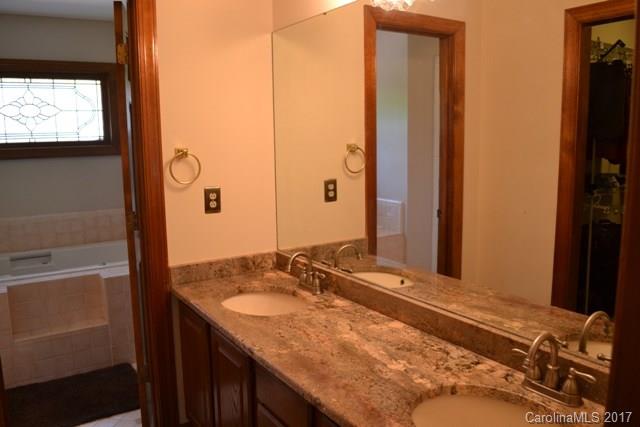 483 Beacon Knoll Lane Fort Mill, SC 29708 - Photo 12 of 21 a bathroom with a granite countertop sink and a mirror