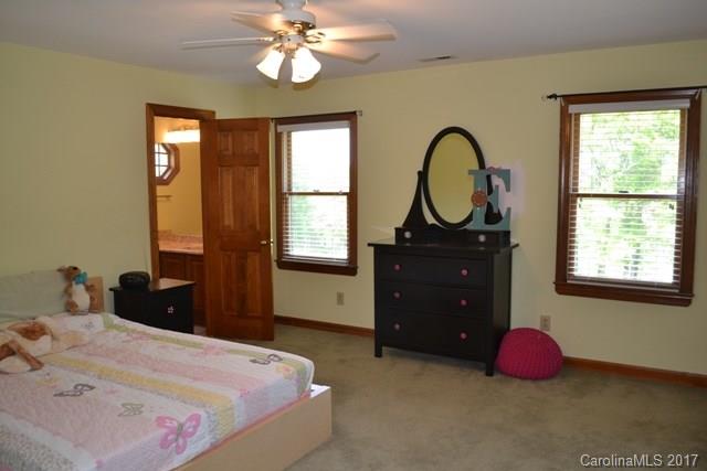 483 Beacon Knoll Lane Fort Mill, SC 29708 - Photo 14 of 21 a bedroom with a bed and a window