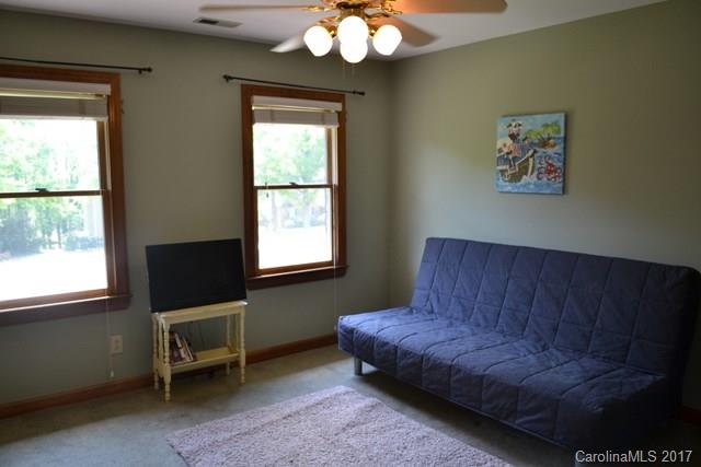 483 Beacon Knoll Lane Fort Mill, SC 29708 - Photo 17 of 21 a living room with furniture and a window