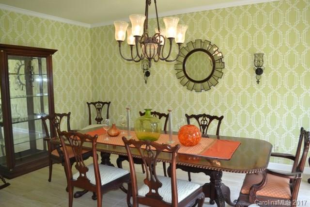 483 Beacon Knoll Lane Fort Mill, SC 29708 - Photo 4 of 21 a view of a dining room with furniture and chandelier