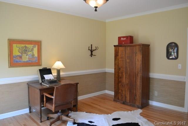 483 Beacon Knoll Lane Fort Mill, SC 29708 - Photo 5 of 21 a view of a workspace with furniture and wooden floor