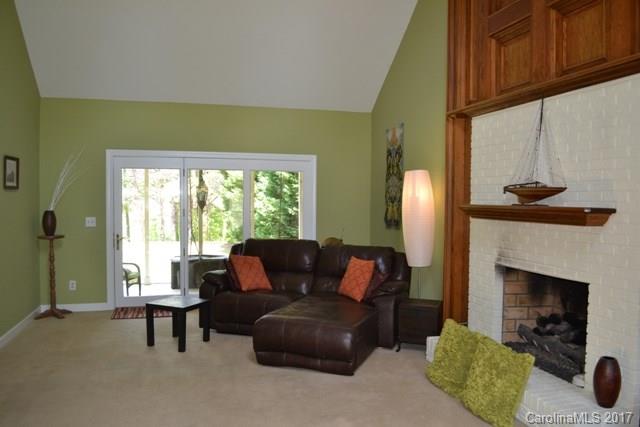 483 Beacon Knoll Lane Fort Mill, SC 29708 - Photo 8 of 21 a living room with furniture and a fireplace