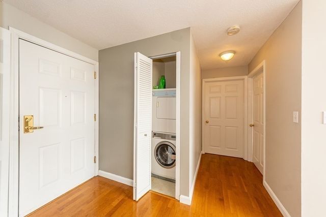 a view of a bathroom with a sink and a mirror