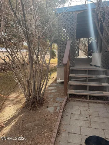a view of entryway with wooden floor